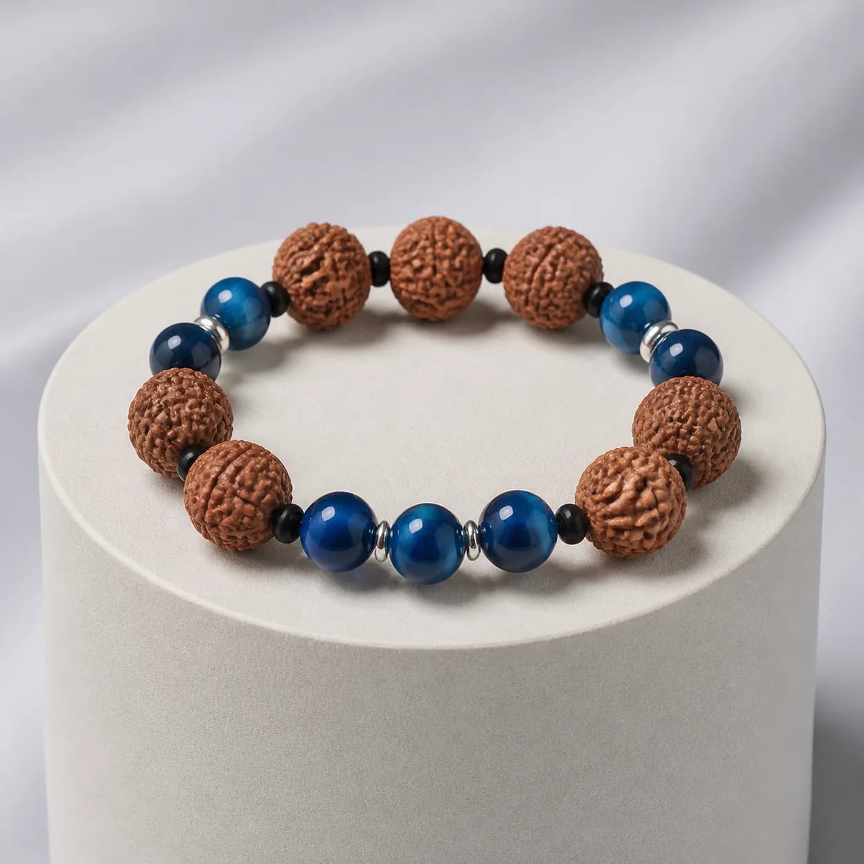 A rudraksha bracelet with tiger's eye stones